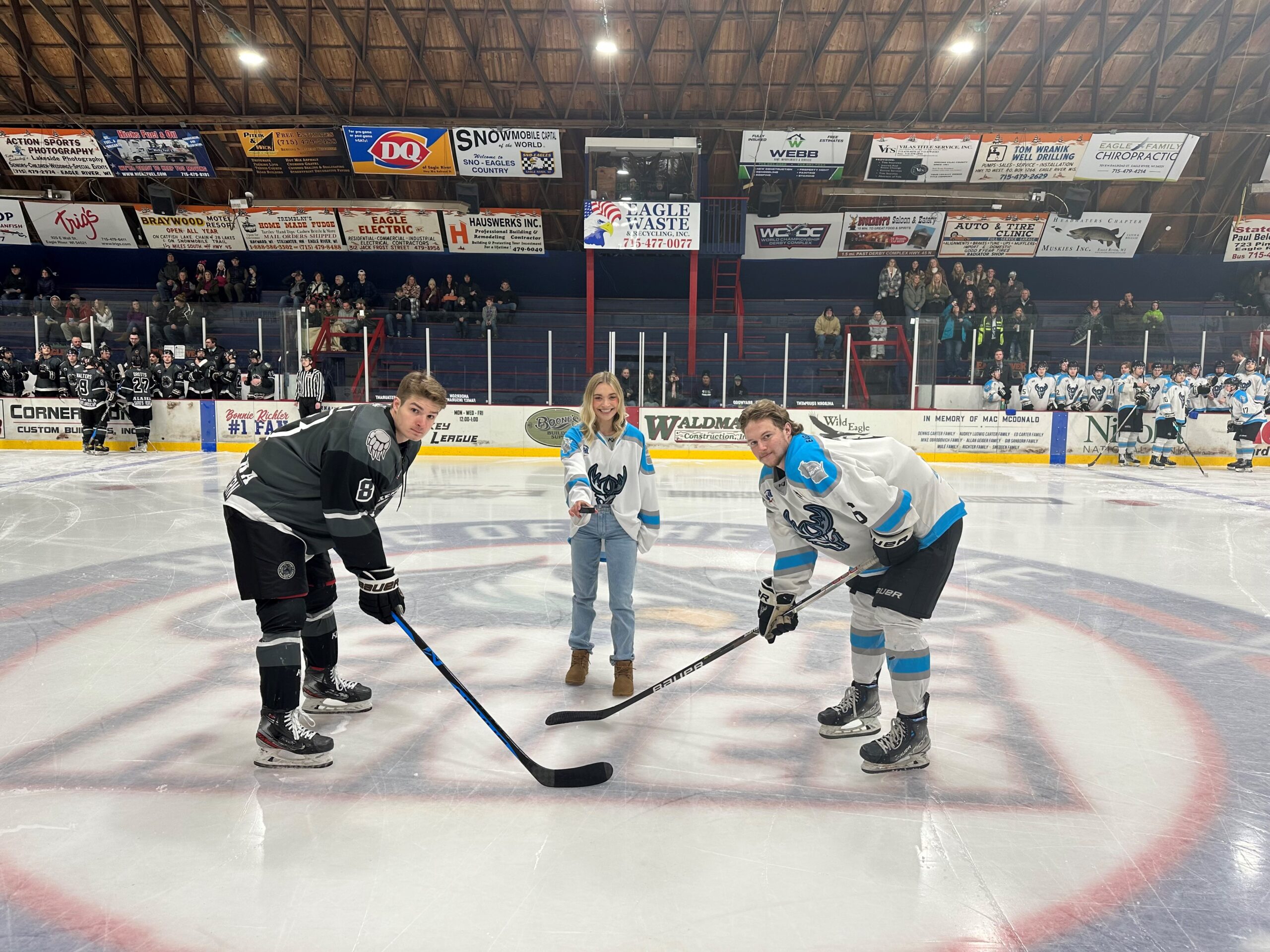 NASCAR driver Natalie Decker performs the ceremonial puck drop on New Year's Eve